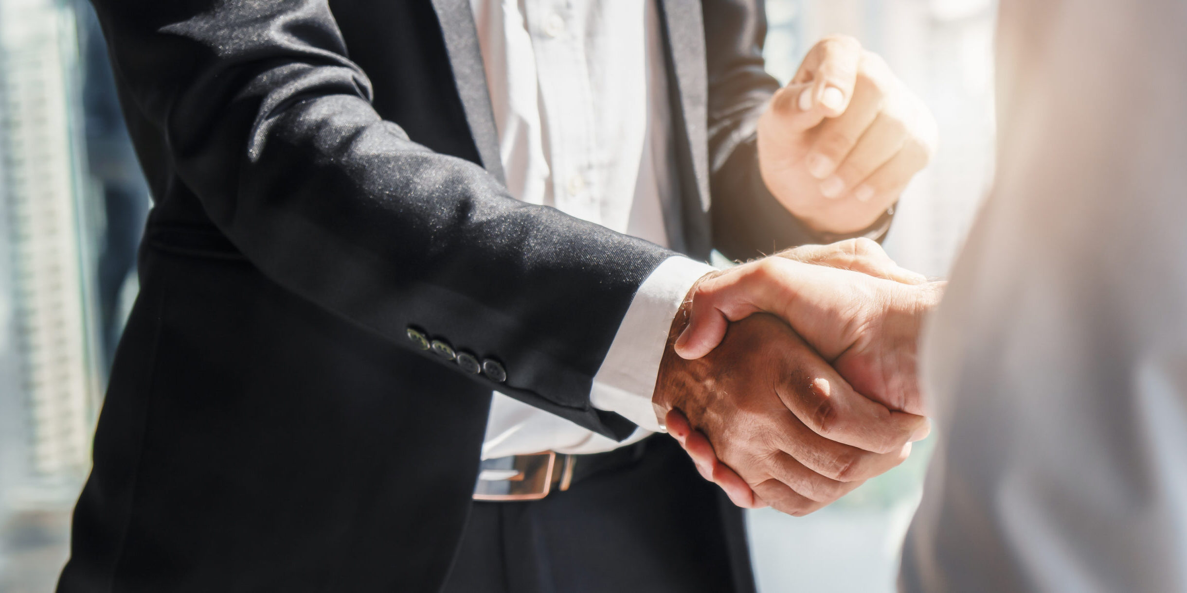 business background of businessman having handshake