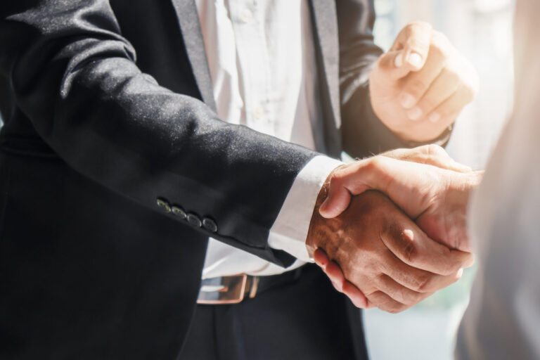 business background of businessman having handshake
